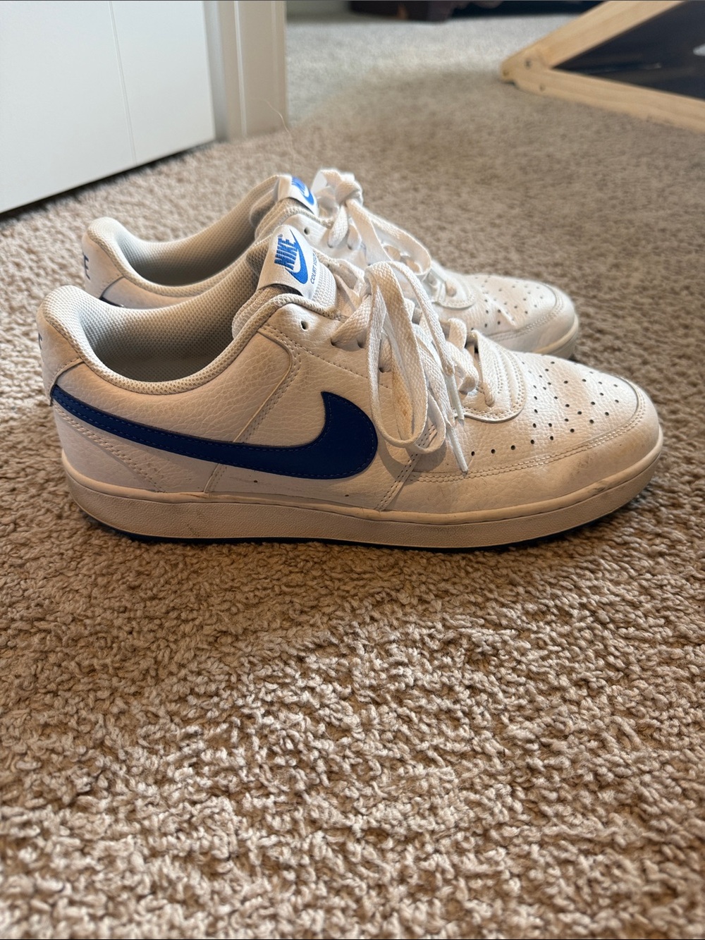 Nike White Leather Low-Top Sneakers with Blue Swoosh